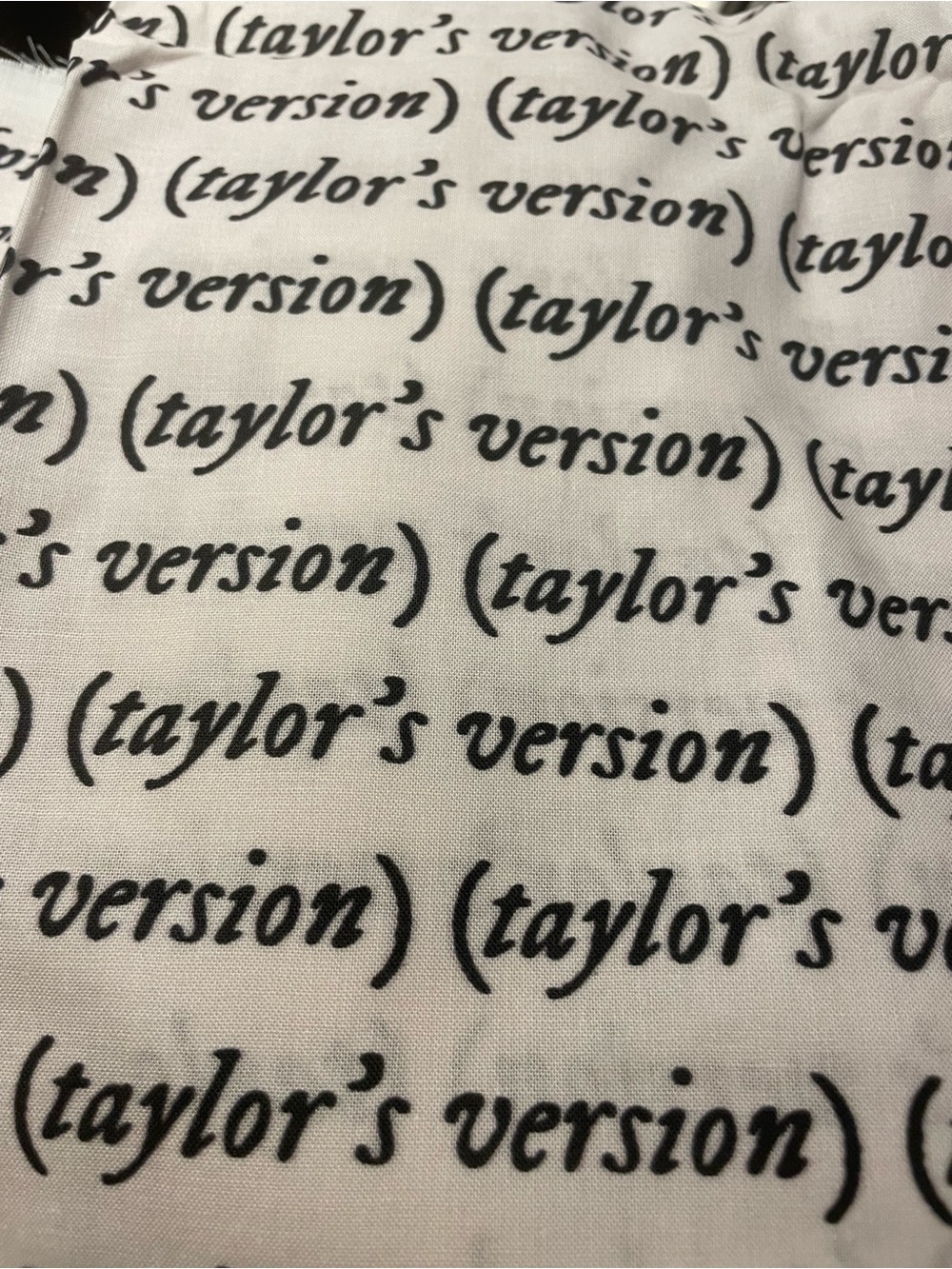 Taylor's Version Script Print Fabric - Black on pinky White